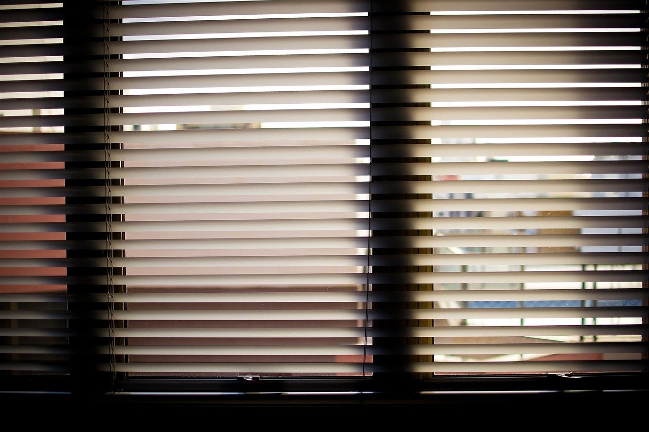 image of blinds drawn in a home for privacy